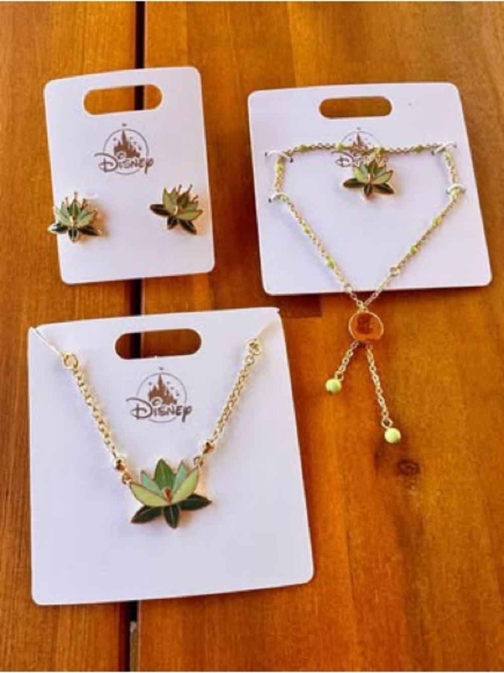 Disney Gold-Tone Necklace and Earrings Set with Green Lotus Accents